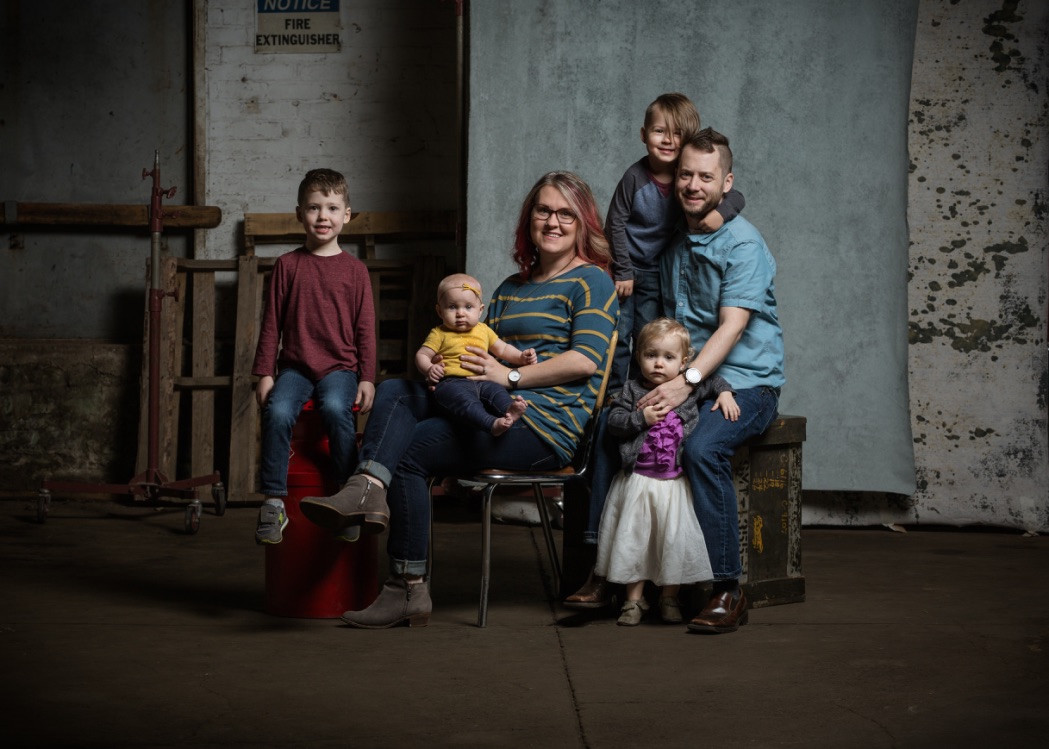 The Derington family together in a studio