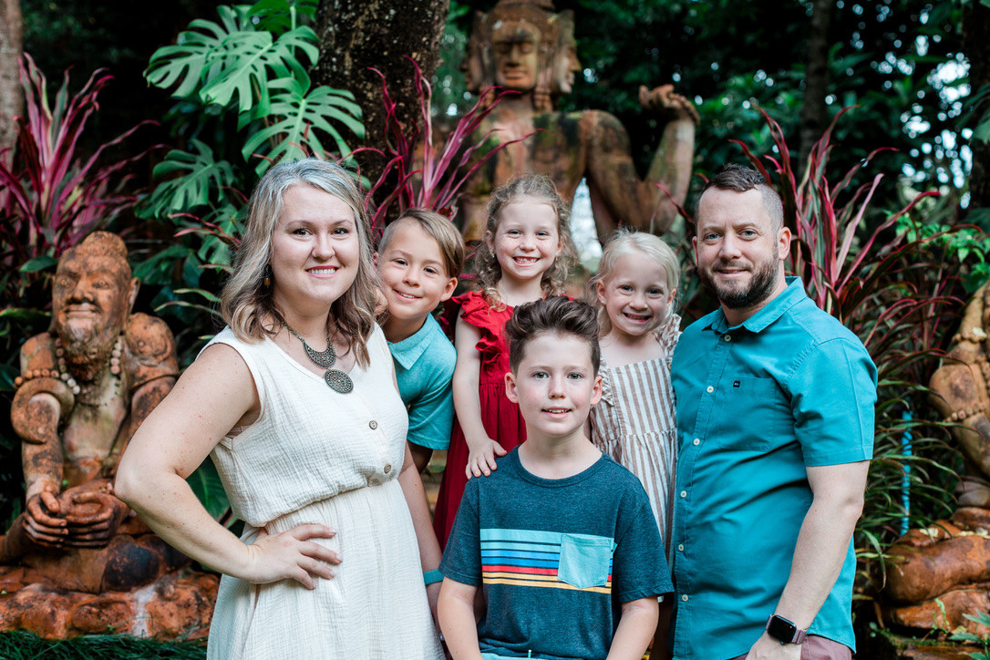 The Derington family together in a garden